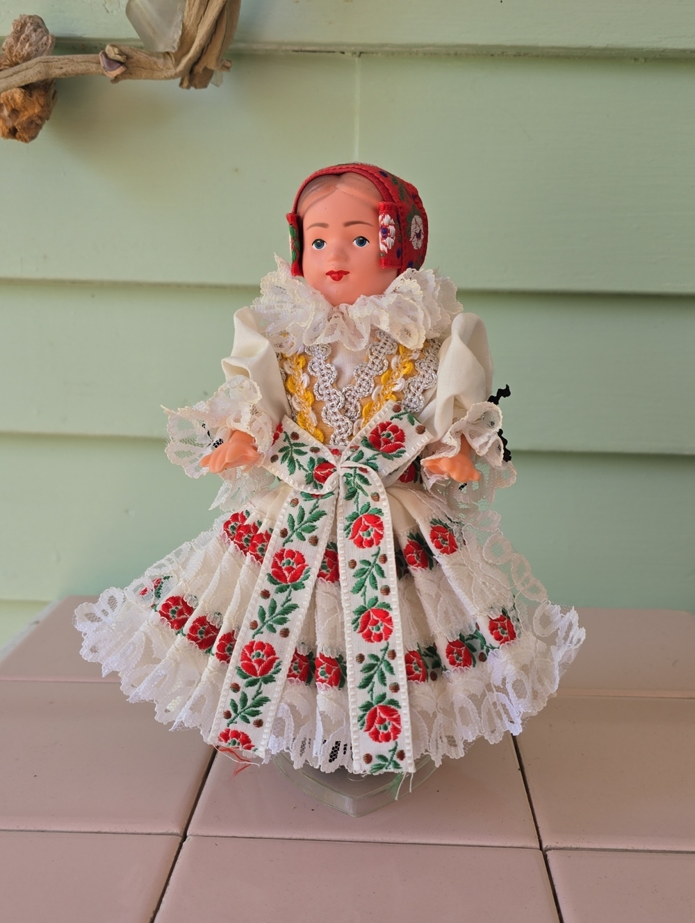 Vintage celluloid or rubber doll in traditional Czech folk costume